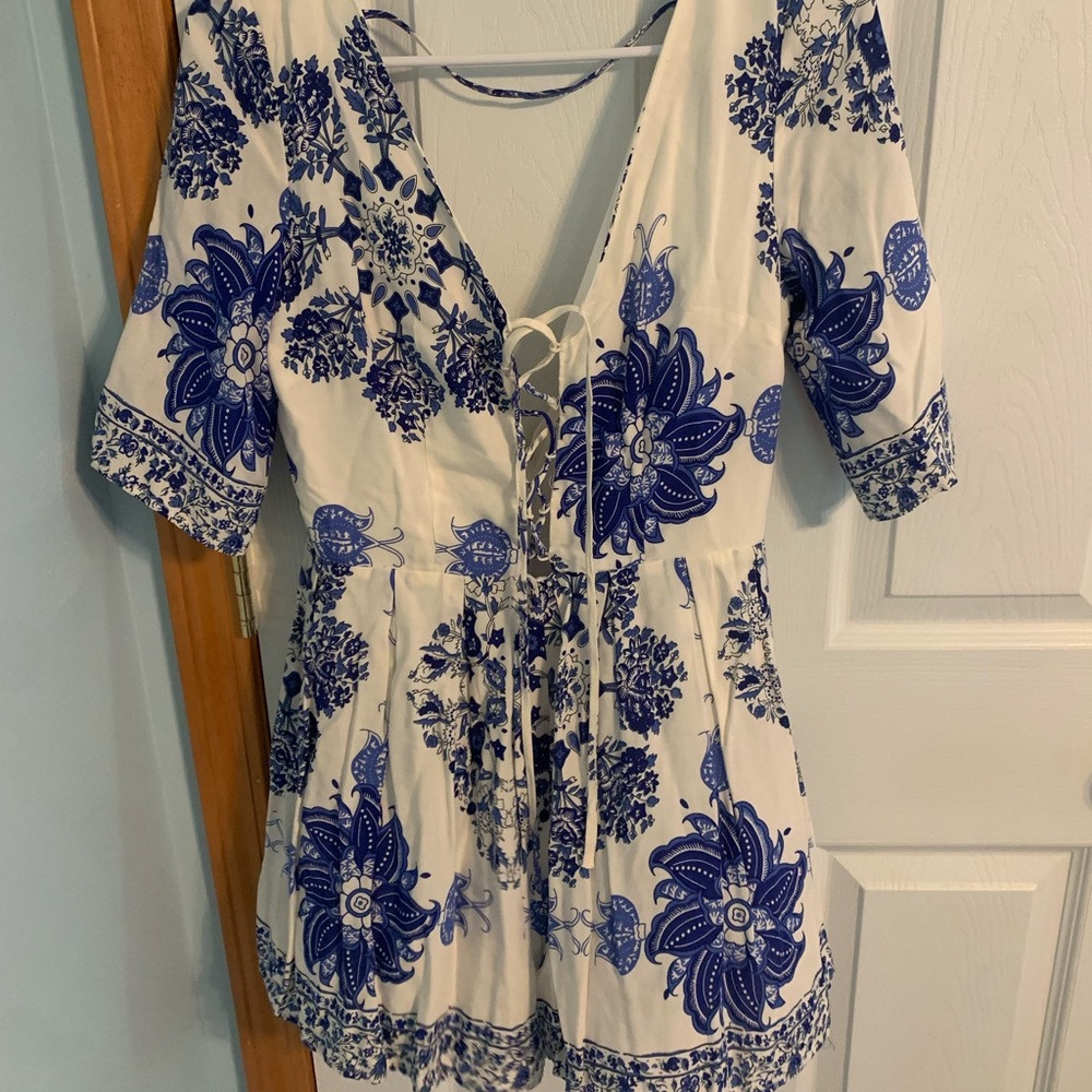 White with blue flowers romper